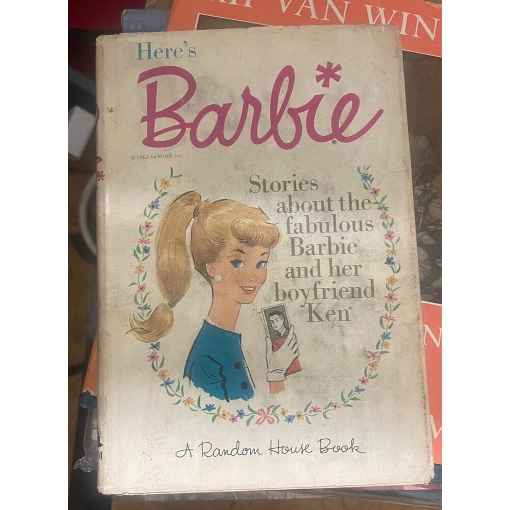 vintage 1962 edition of the hardcover book Here's Barbie,